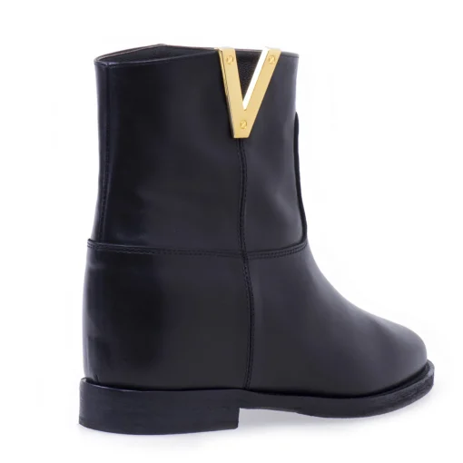 Tronchetto Via Roma 15 in pelle con accessorio a "V" in metall